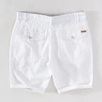 Strandshorts för herr i linne-bomull, sommarlook med knappstängning - Sandro