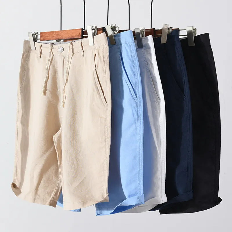 Strandshorts för herr i linne-bomull, sommarlook med knappstängning - Sandro